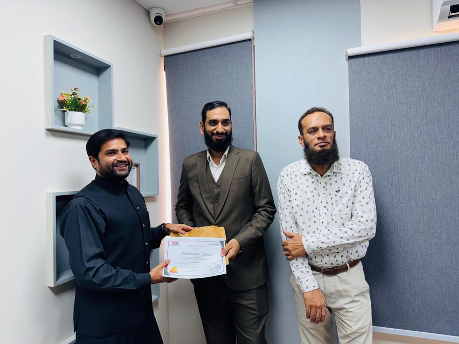 Client training session and certificate ceremony photo