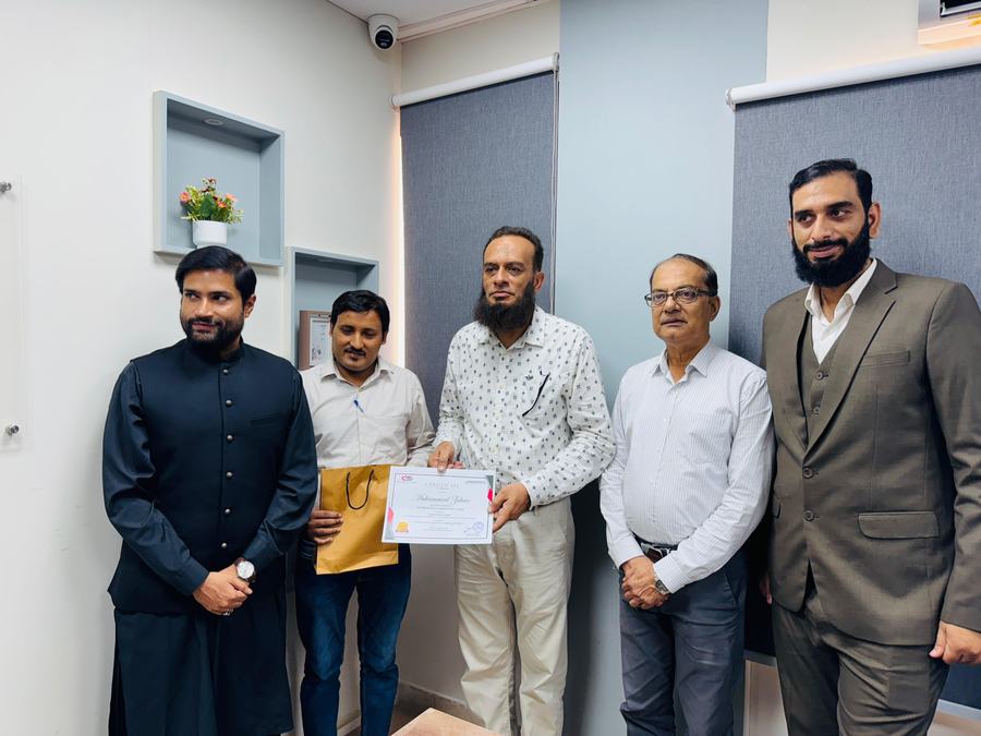 Client training session and certificate ceremony photo